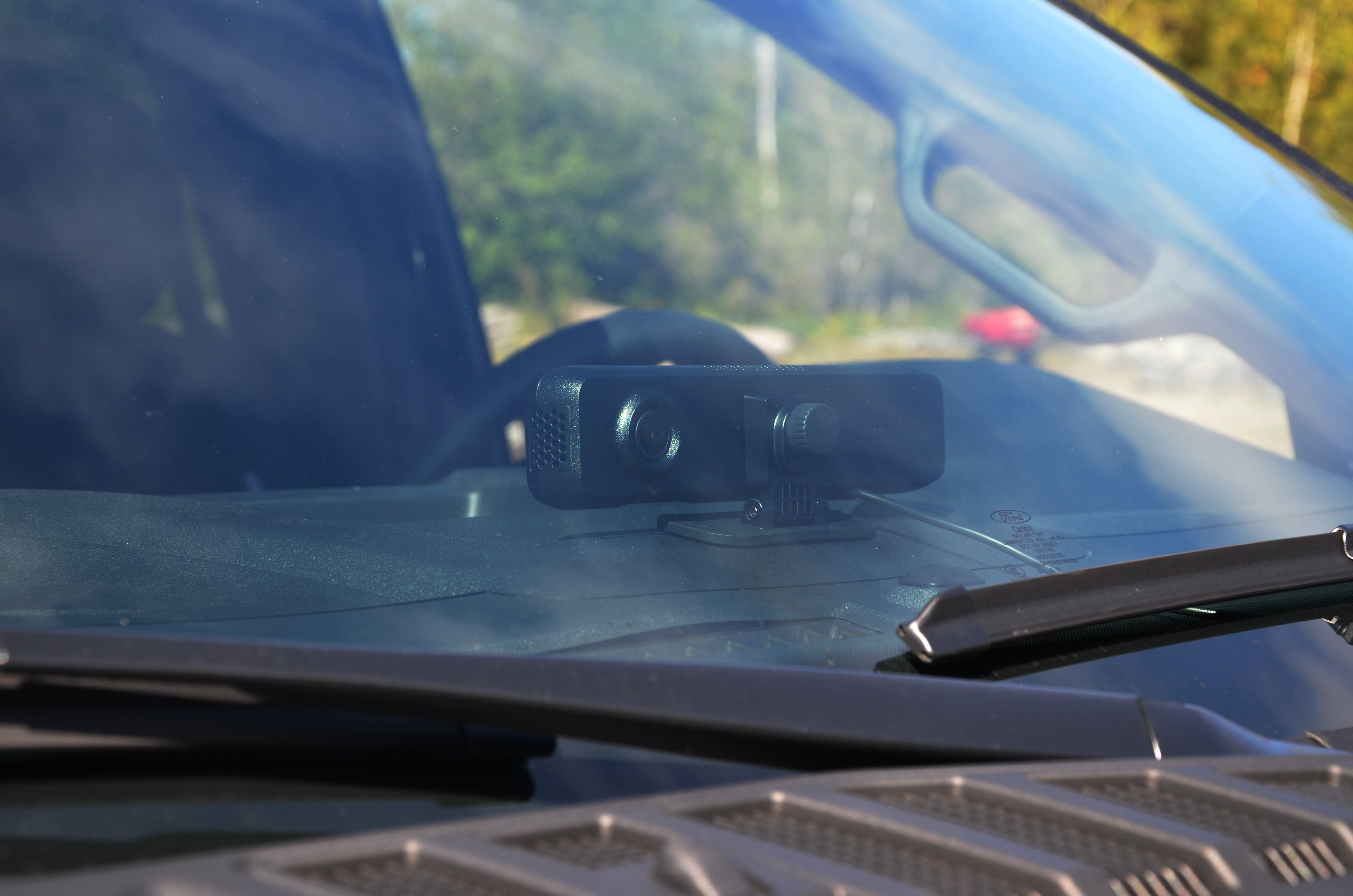 Road facing camera shot outside vehicle